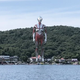 The lanky, alien Ultraman towering over the world.